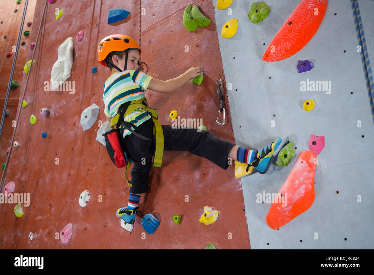 Boy indoor wall climbing helmet hi-res stock photography and images - Alamy