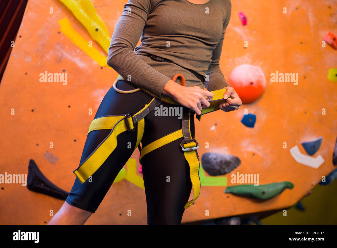 Adjusting climbing harness hi-res stock photography and images - Alamy