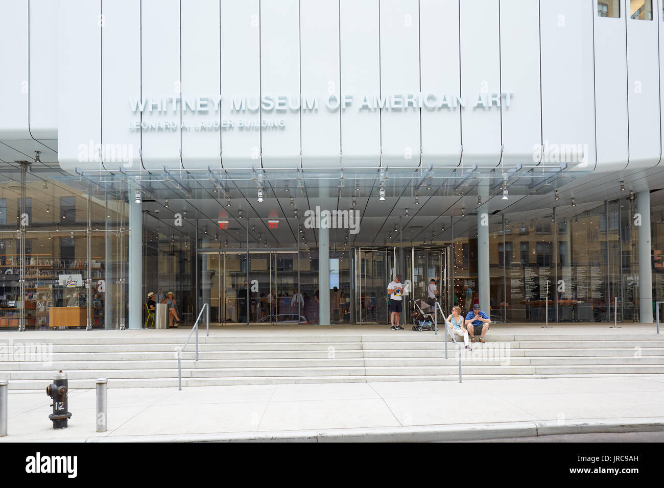 Whitney Museum of American Art facade with people in New York Stock Photo