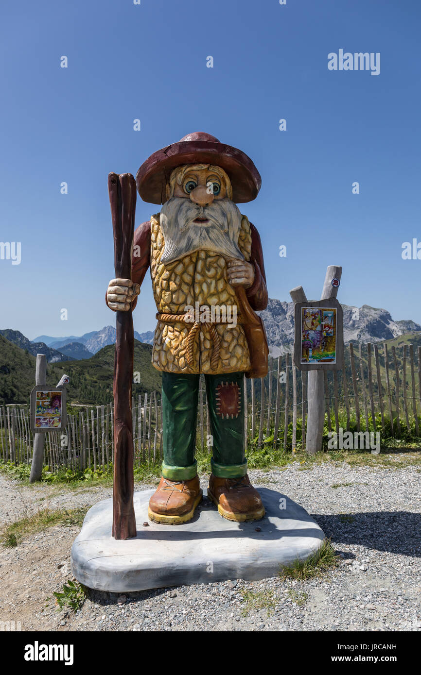 Wooden figure at mountain playground Almrausch above Nassfeld, Carinthia, Austria Stock Photo