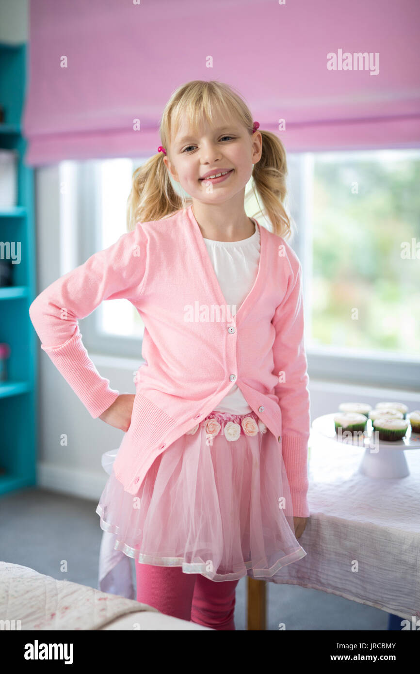 Portrait of smiling girl posing in bedroom at home Stock Photo - Alamy