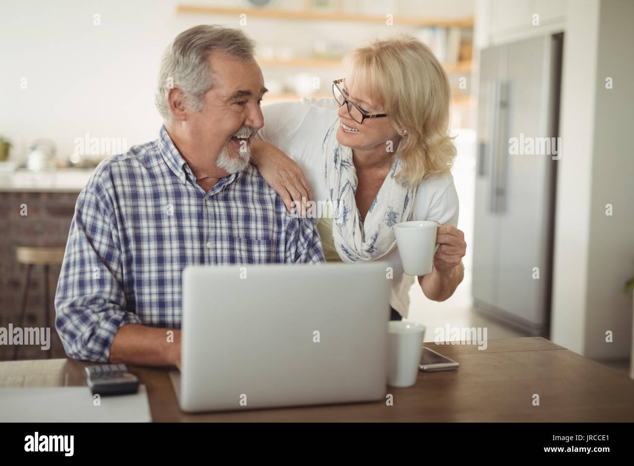Documents laptop old couple hi-res stock photography and images - Alamy