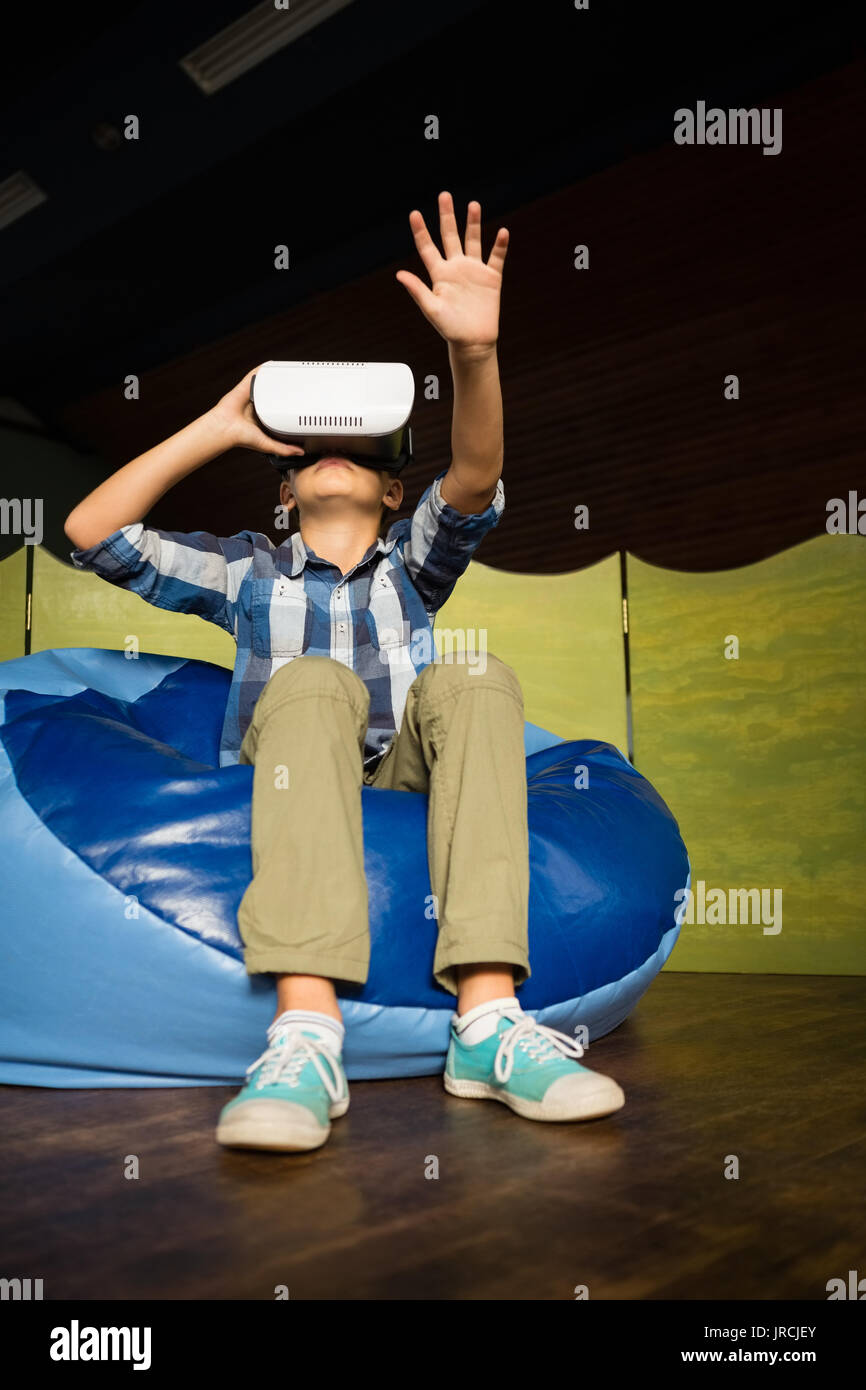 Boy sitting on bean bag hi-res stock photography and images - Alamy