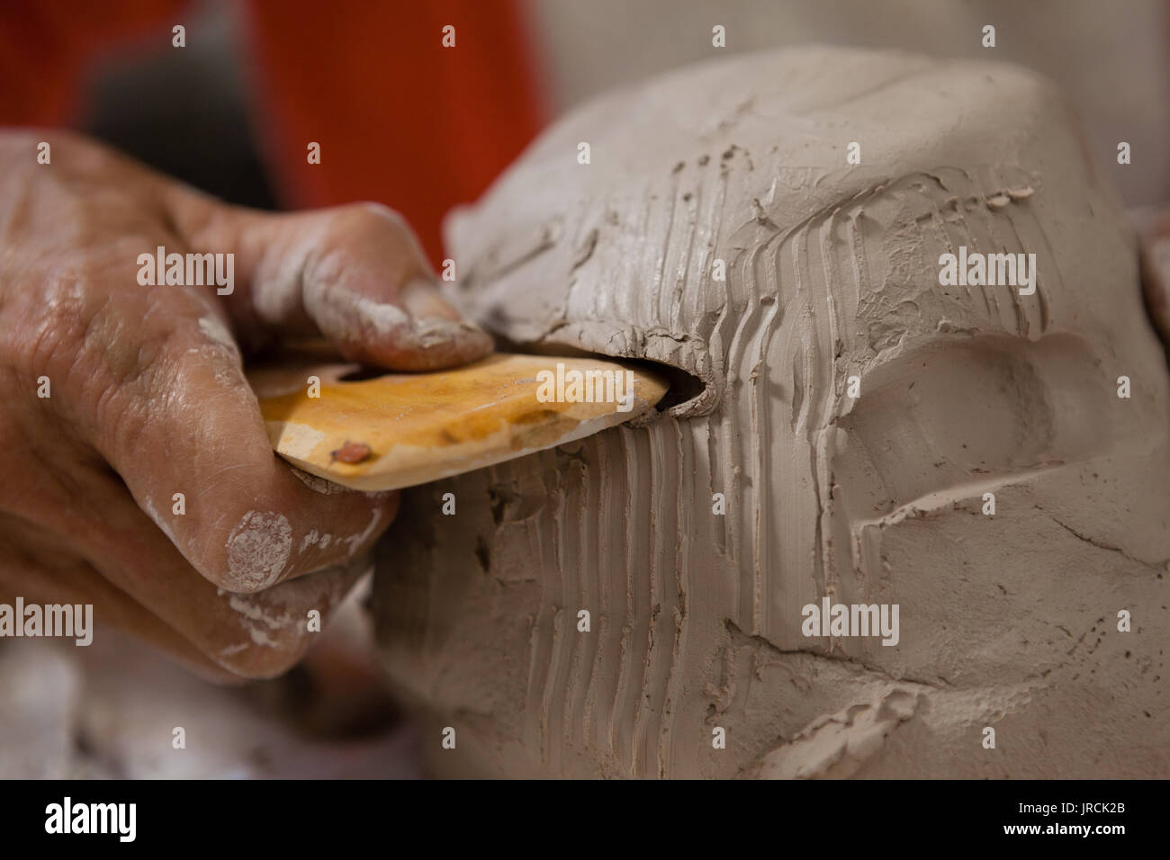 Hand of woman shaping a molded clay in drawing class Stock Photo Alamy