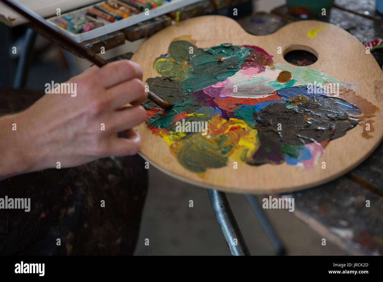 Female artist holding color palette hi-res stock photography and images ...