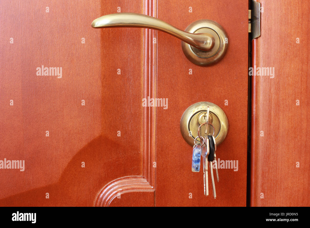keys in the door keyhole Stock Photo