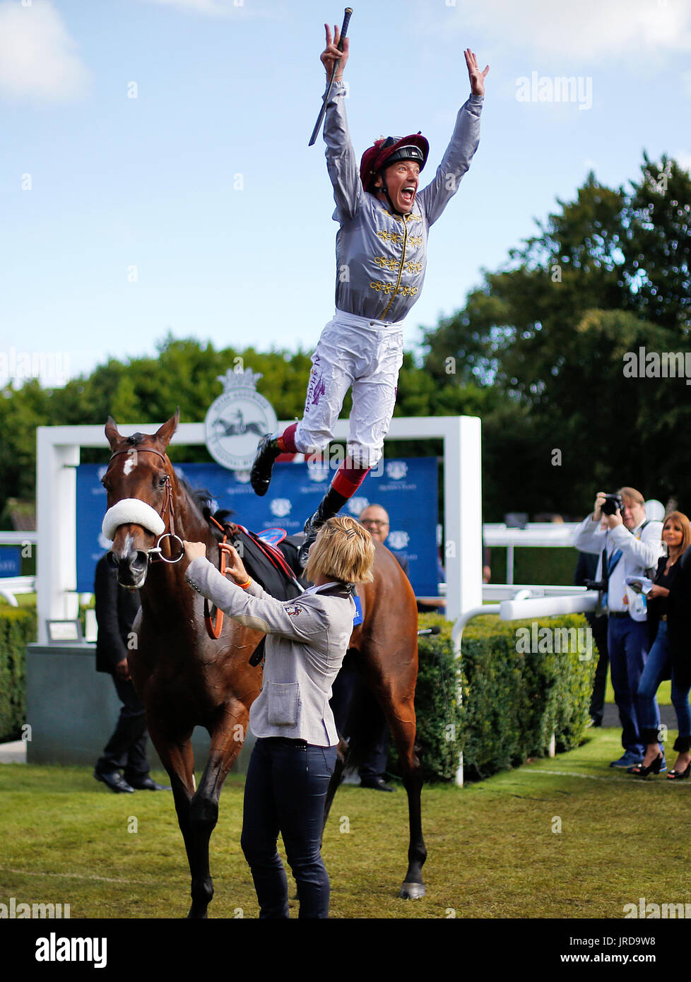 Jockey Frankie Dettori Celebrates By Jumping From Al Jazi After Winning The L Ormarins Queens Plate Oak Tree Stakes During Day Four Of The Qatar Goodwood Festival At Goodwood Racecourse Stock Photo