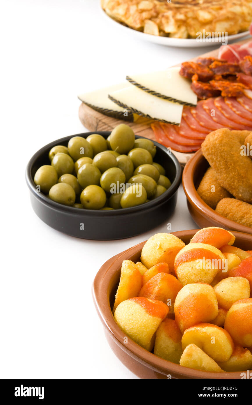 Traditional spanish tapas. Croquettes, olives, ham and patatas bravas
