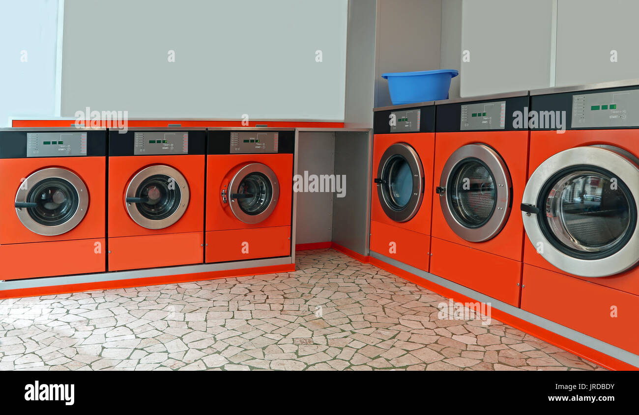 Automatic coin operated laundry with large portholes for washing dirty