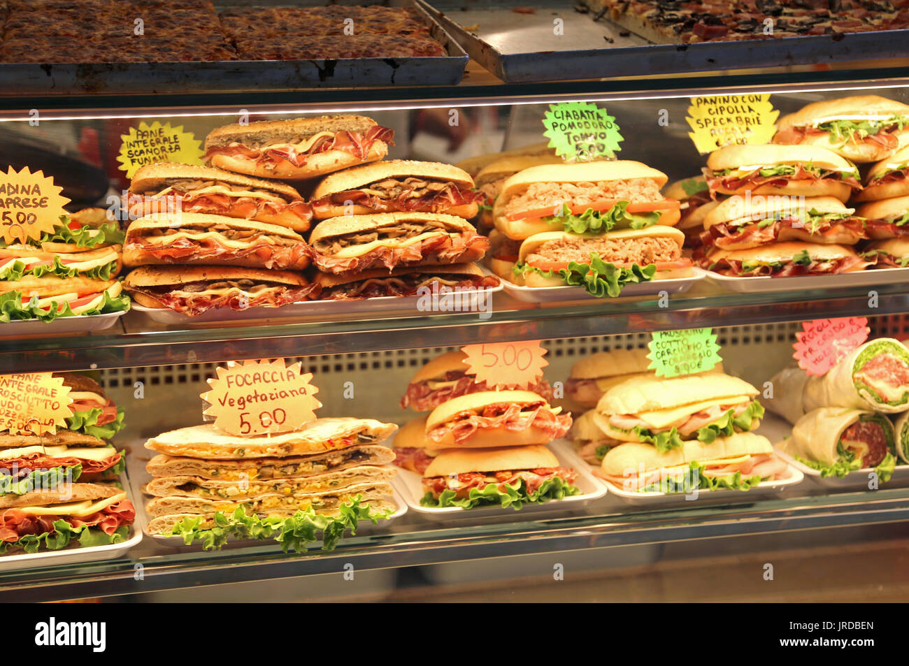 Lots sandwiches stuffed for sale in the bar in italy with the price