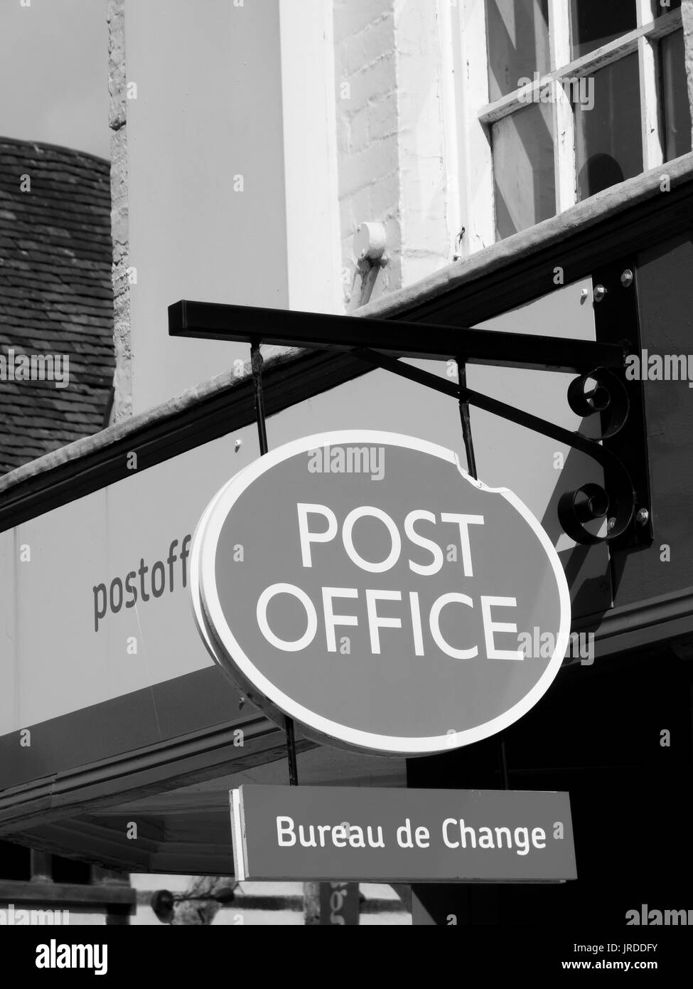 Post Office sign over premises with bureau de change currency services available Stock Photo