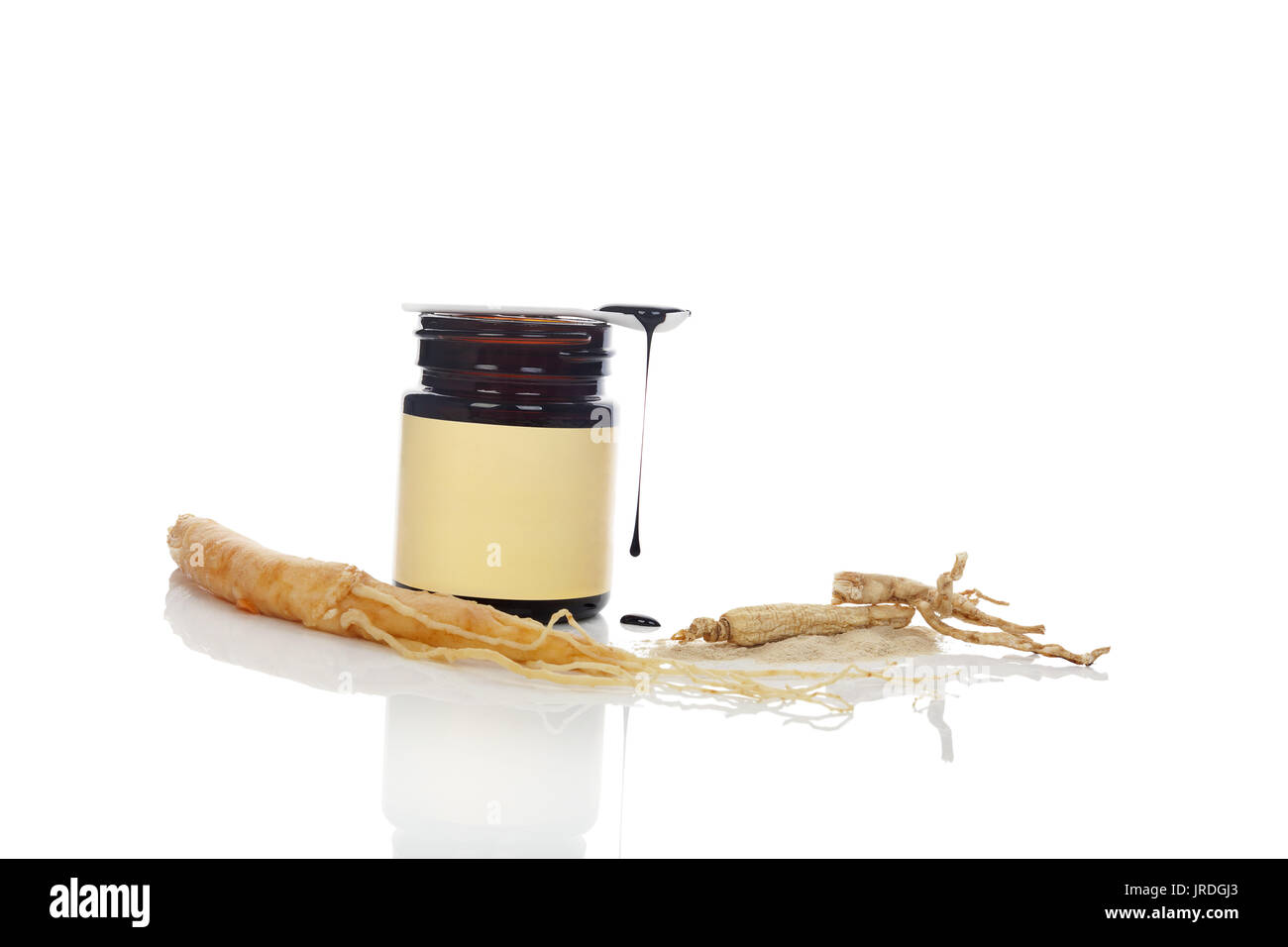 Korean ginseng and root, powder and extract in glass bottle isolated on
