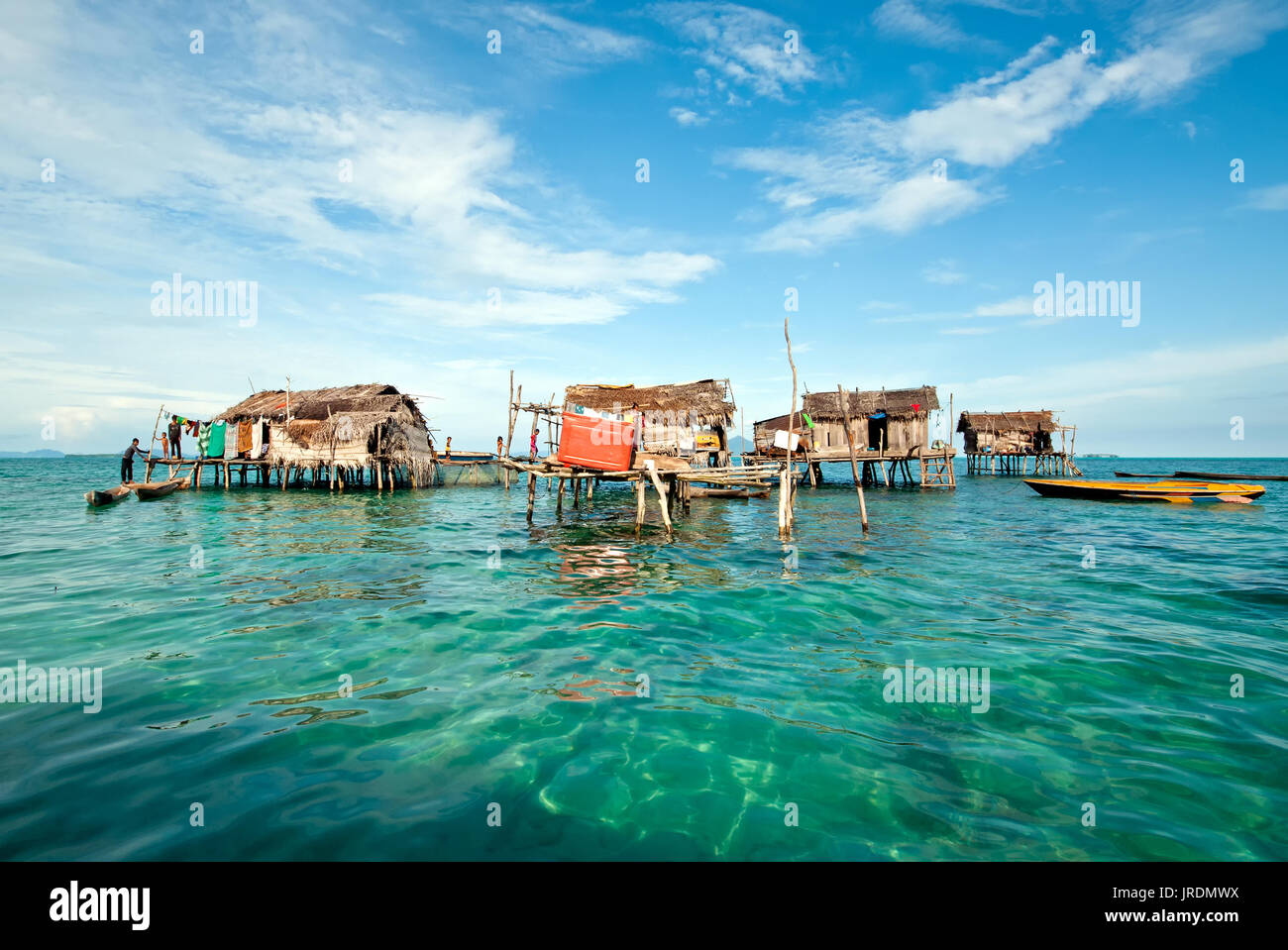 Semporna , Malaysia: September 17, 2011: Bajau Laut or sea nomadic people stilted houses at the village in Tun Sakaran Marine Park. Stock Photo