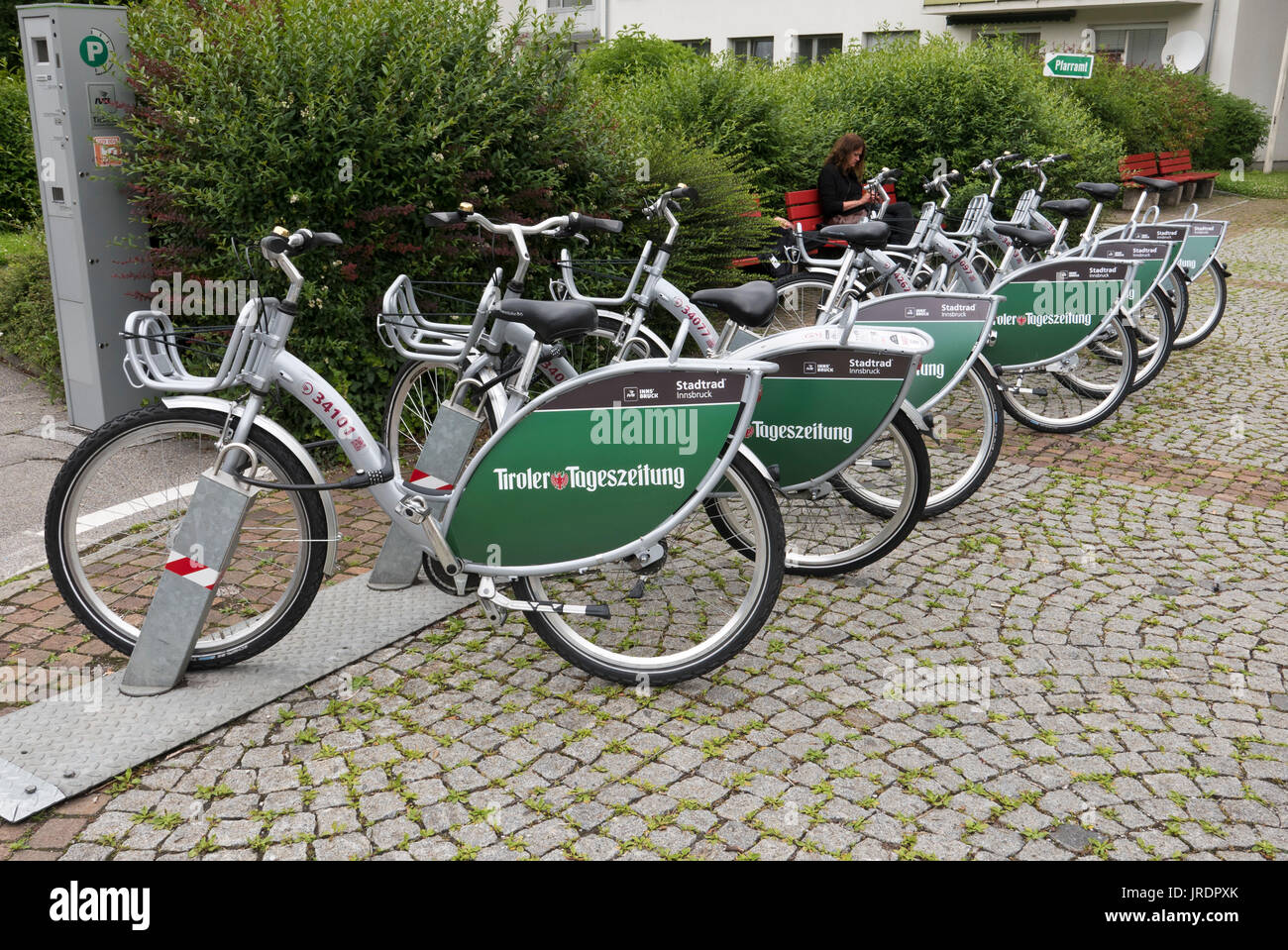 Bicycles on bicycle racks for hire, innsbruck, Austria Stock Photo Alamy