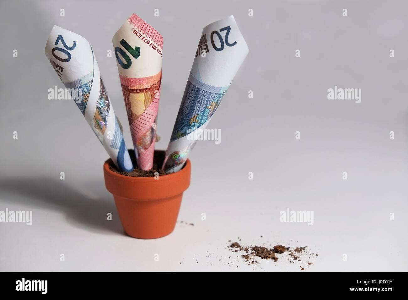 Stack of money banknotes is growing up hi-res stock photography and ...