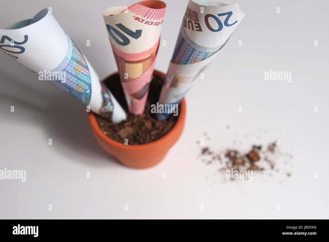 Stack of money banknotes is growing up hi-res stock photography and ...