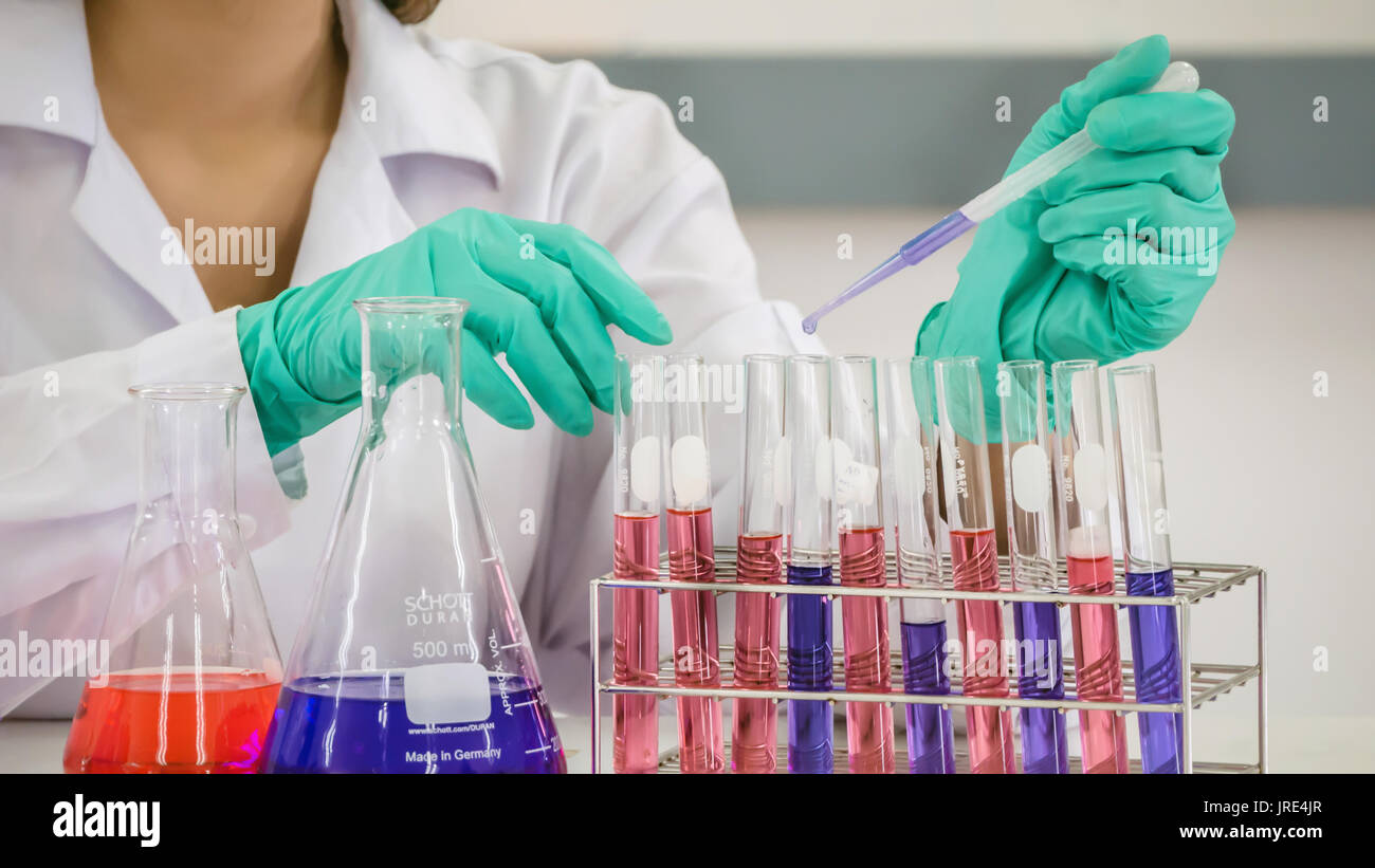 scientist with equipment and science experiments in laboratory Stock Photo