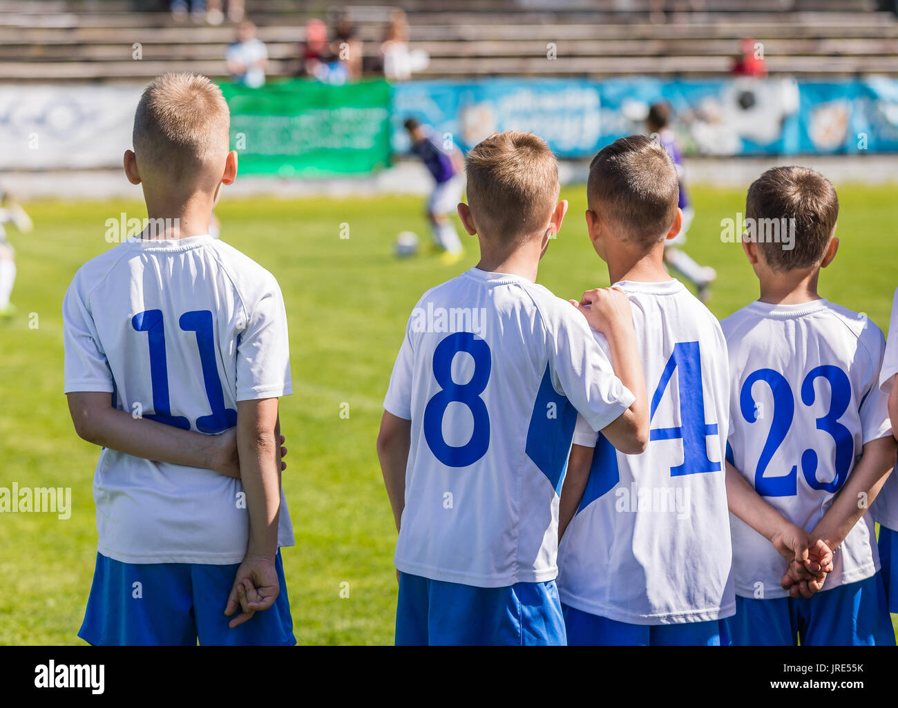 Young Boys Soccer Football Players. Youth Footballers on the Field. Children Sport Soccer Youth Team Stock Photo