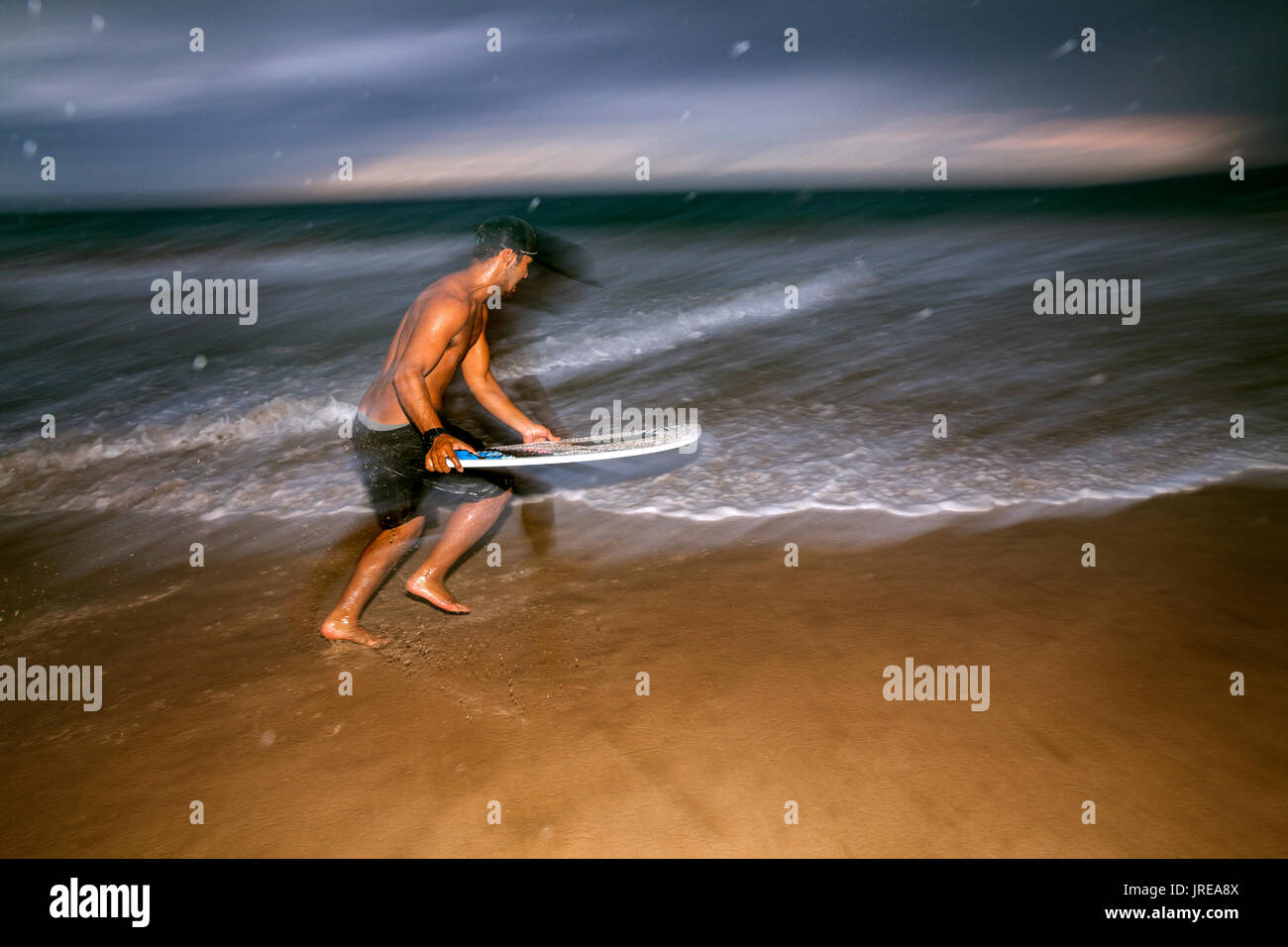 HI0040600...HAWAI'I Kaleo Carpio skim boarding at Hapuna Beach State Recreation Area on the