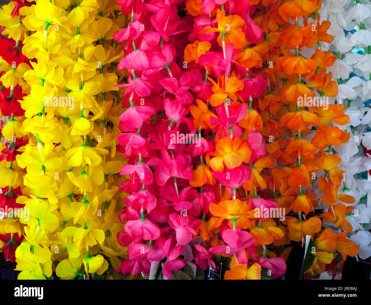 HI00453-00...HAWAI'I - Fake leis in a store front on the island of Hawai'i. Stock Photo