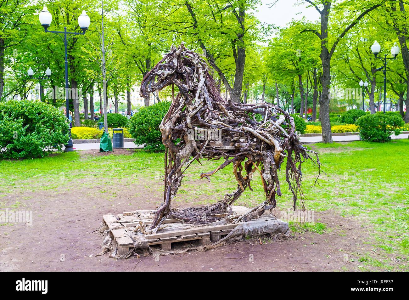 MOSCOW, RUSSIA - MAY 11, 2015: The sculpture of wooden horse located in Gorky Park, on May 11 in Moscow, Russia Stock Photo