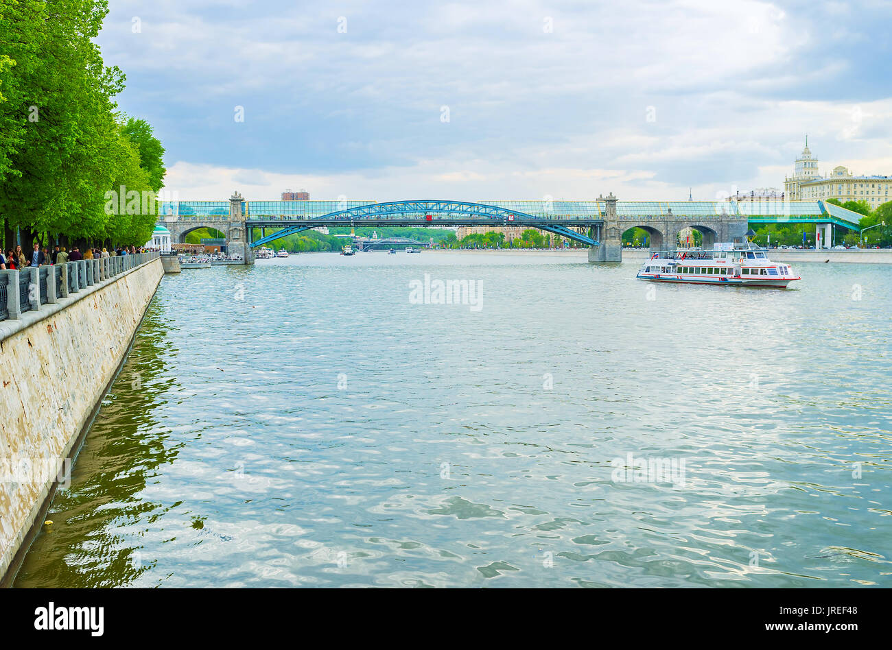 MOSCOW, RUSSIA - MAY 11, 2015: The modern pedestrian Andrew Bridge is a fine viewpoint, overlooking both banks of Moskva River, on May 11 in Moscow, R Stock Photo