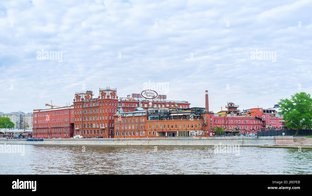 MOSCOW, RUSSIA - MAY 11, 2015:  The beautiful red buildings of former Red October chocolate factory nowadays serves as office and leisure complex, on  Stock Photo