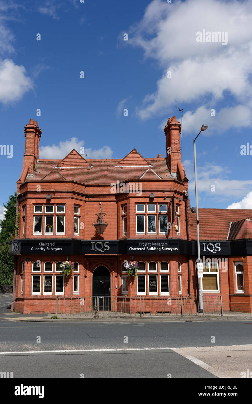 Red brick building at road junction in whitefield bury lancashire uk