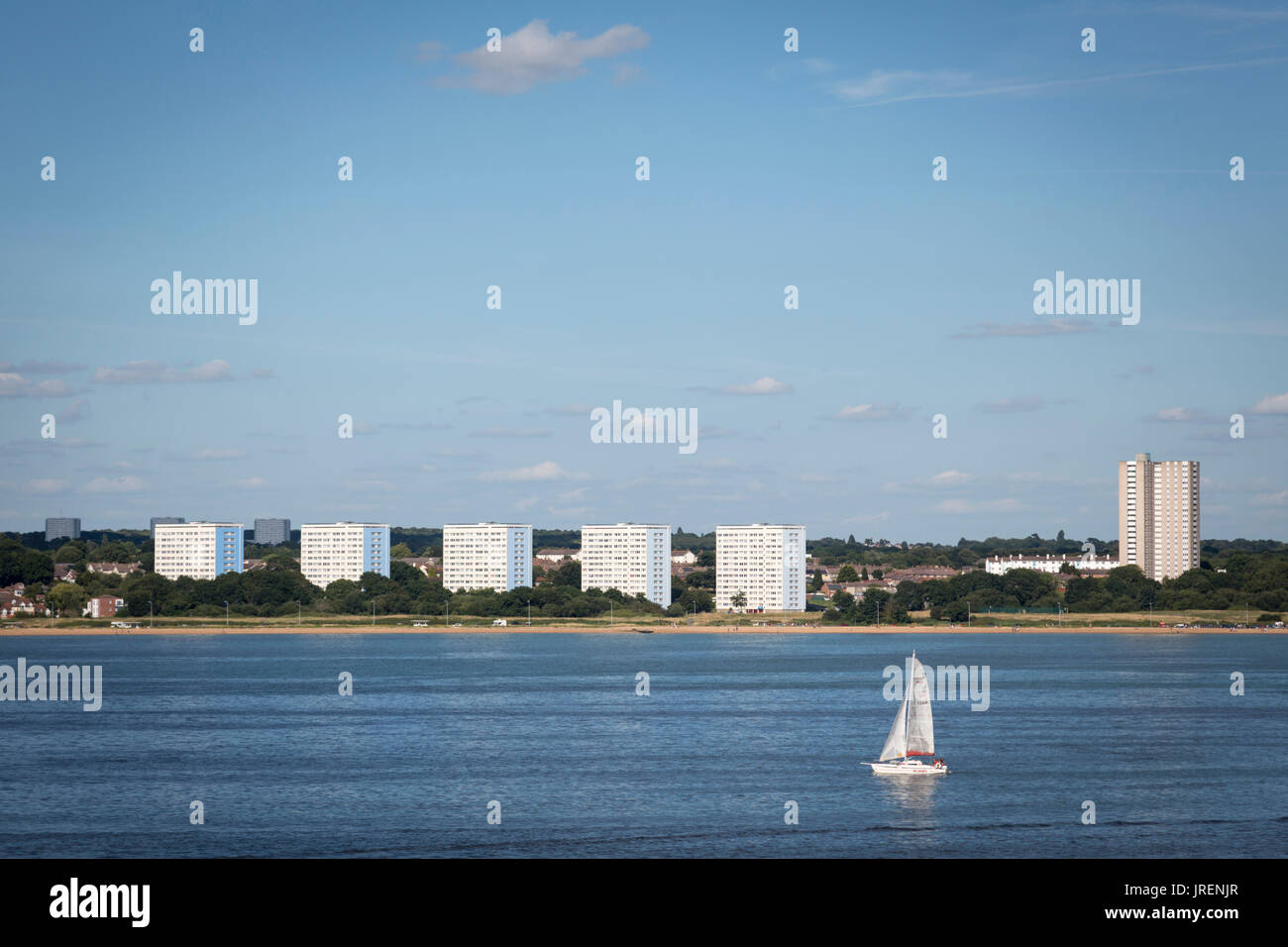 Sailing by the shore Stock Photo