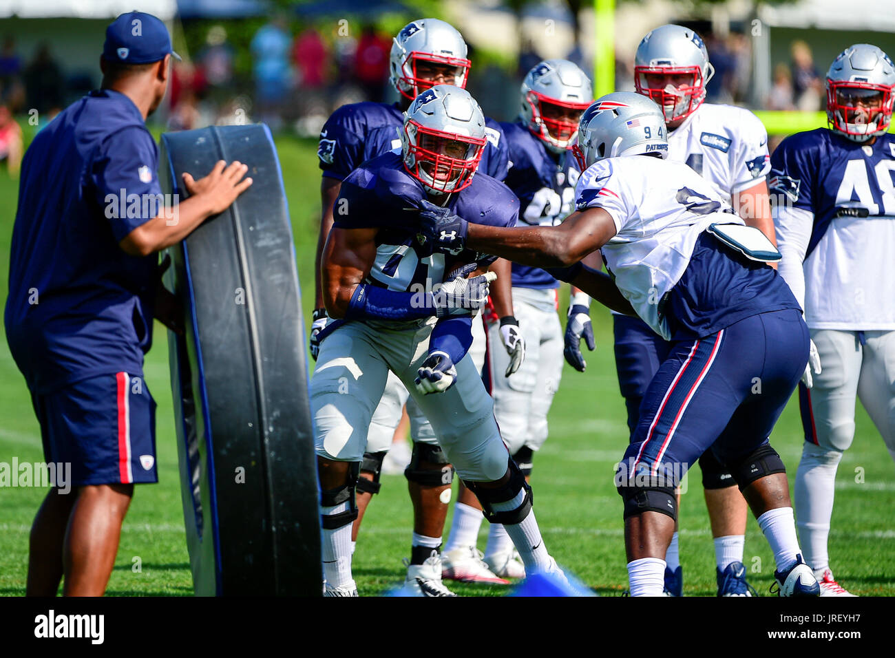 Foxborough, USA. 4th Aug, 2017. New England Patriots defensive end Deatrich Wise Jr (91) and defensive end Kony Ealy (94) do a drill at the New England Patriots training camp held at Gillette Stadium, in Foxborough, Massachusetts. Credit: Cal Sport Media/Alamy Live News Stock Photo