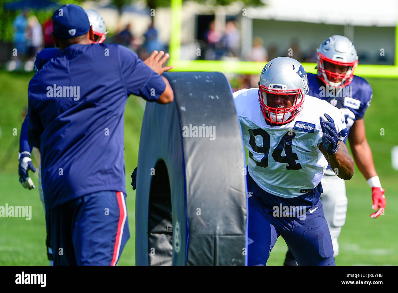 Foxborough, USA. 4th Aug, 2017. New England Patriots defensive end Kony Ealy (94) does a drill at the New England Patriots training camp held at Gillette Stadium, in Foxborough, Massachusetts. Credit: Cal Sport Media/Alamy Live News Stock Photo