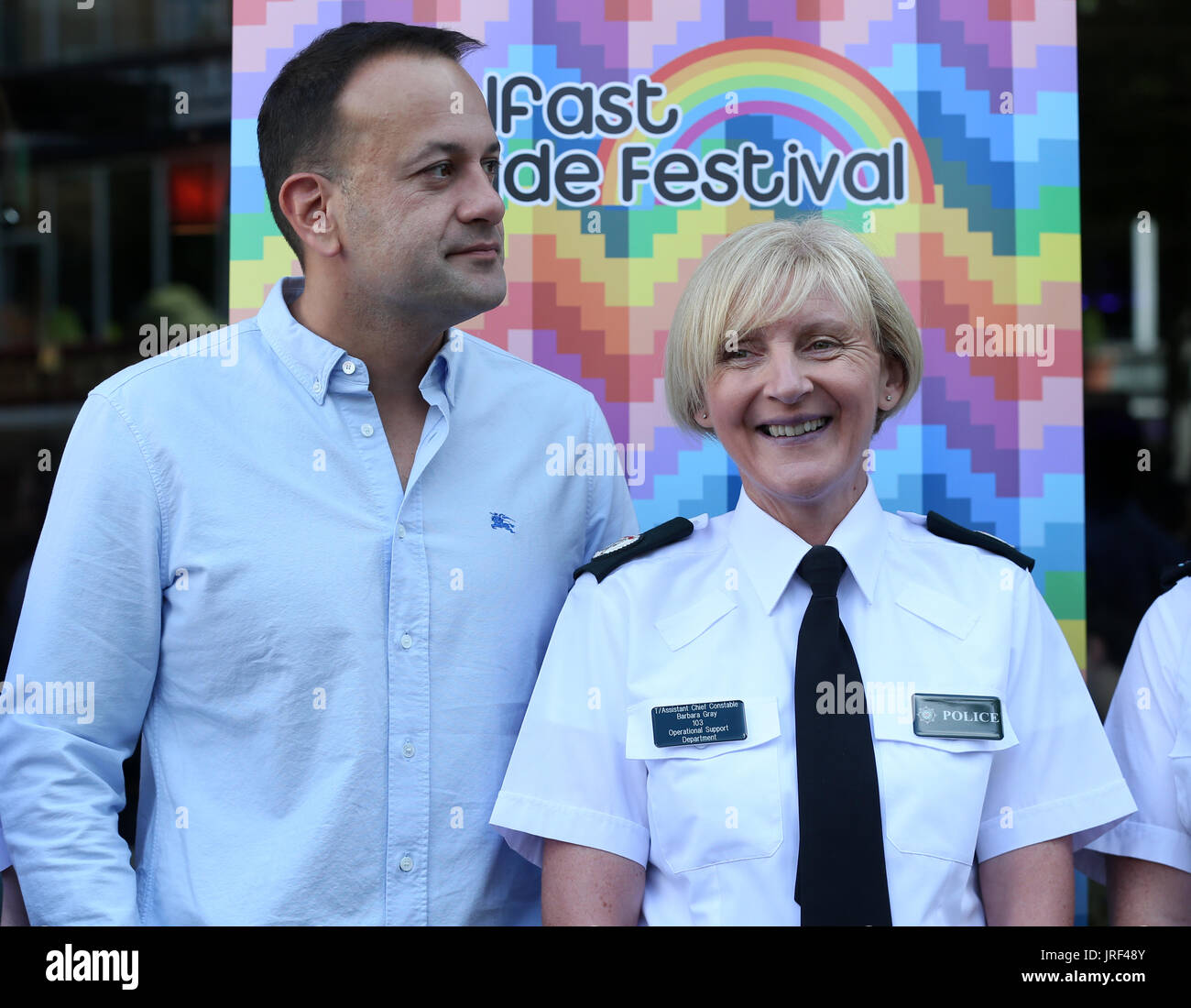 Belfast, Northern Ireland. 5th August 2017. Taoiseach Leo Varadkar poses with members of the Police Service of Northern Ireland LGBT network, including T/Assistant Chief Constable Barbara Gray, alongside members of An Garda Siochana this morning before attending a Pride breakfast event at the Northern Whig bar in Belfast. This is the first time members of the PSNI will be marching in the Pride parade in uniform. Gardai have also been gieven permission to wear their uniforms in the parade. Credit : Laura Hutton/Alamy Live News. Stock Photo
