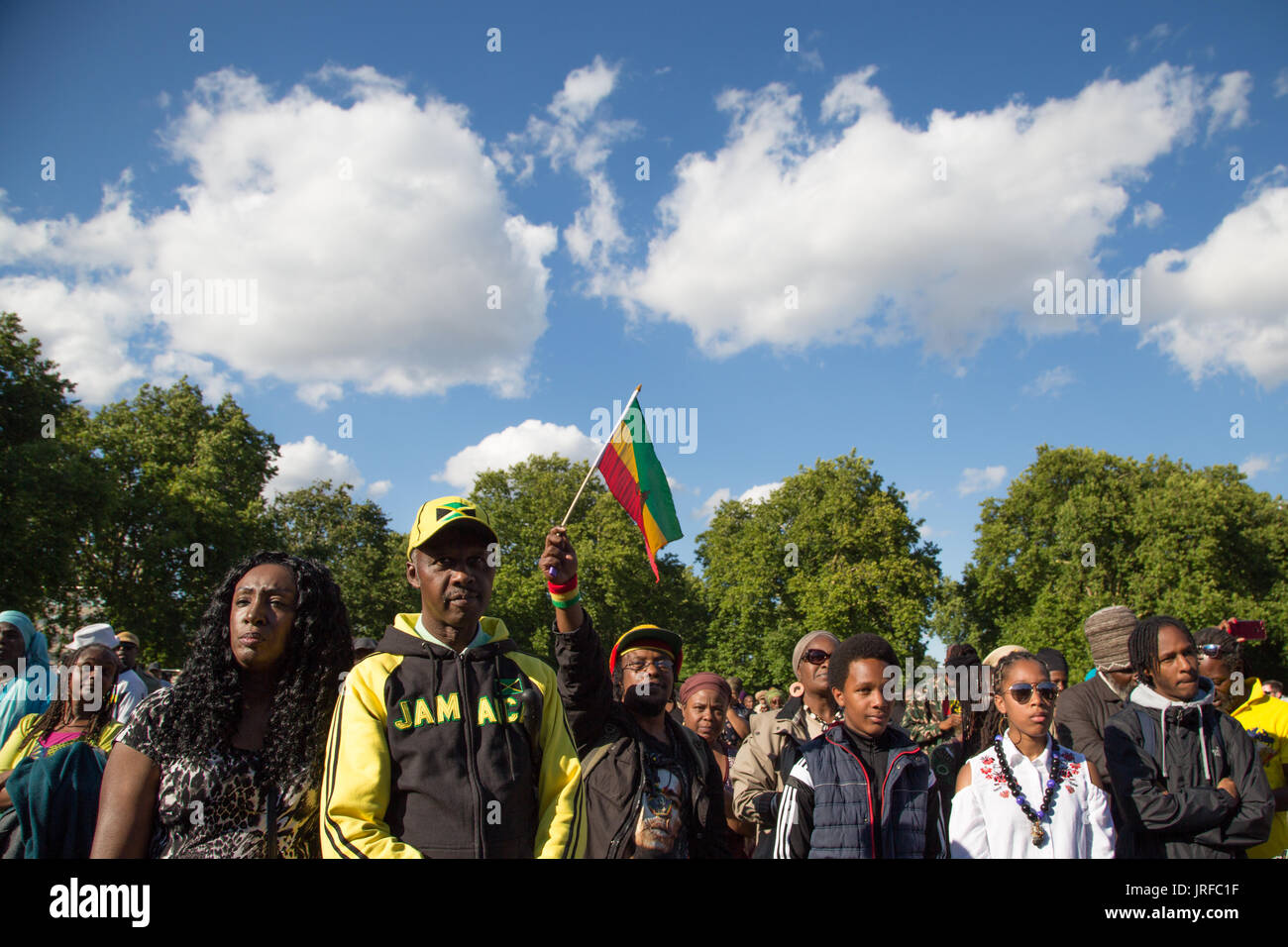 London UK 5th August 2017  People listen to a speaker during  Africa international day of action in Kennington Park South London .The nation of Islam were prevented from addressing the  audience  under the strict terms of the licence from Lambeth council. Credit: Thabo Jaiyesimi/Alamy Live News Stock Photo