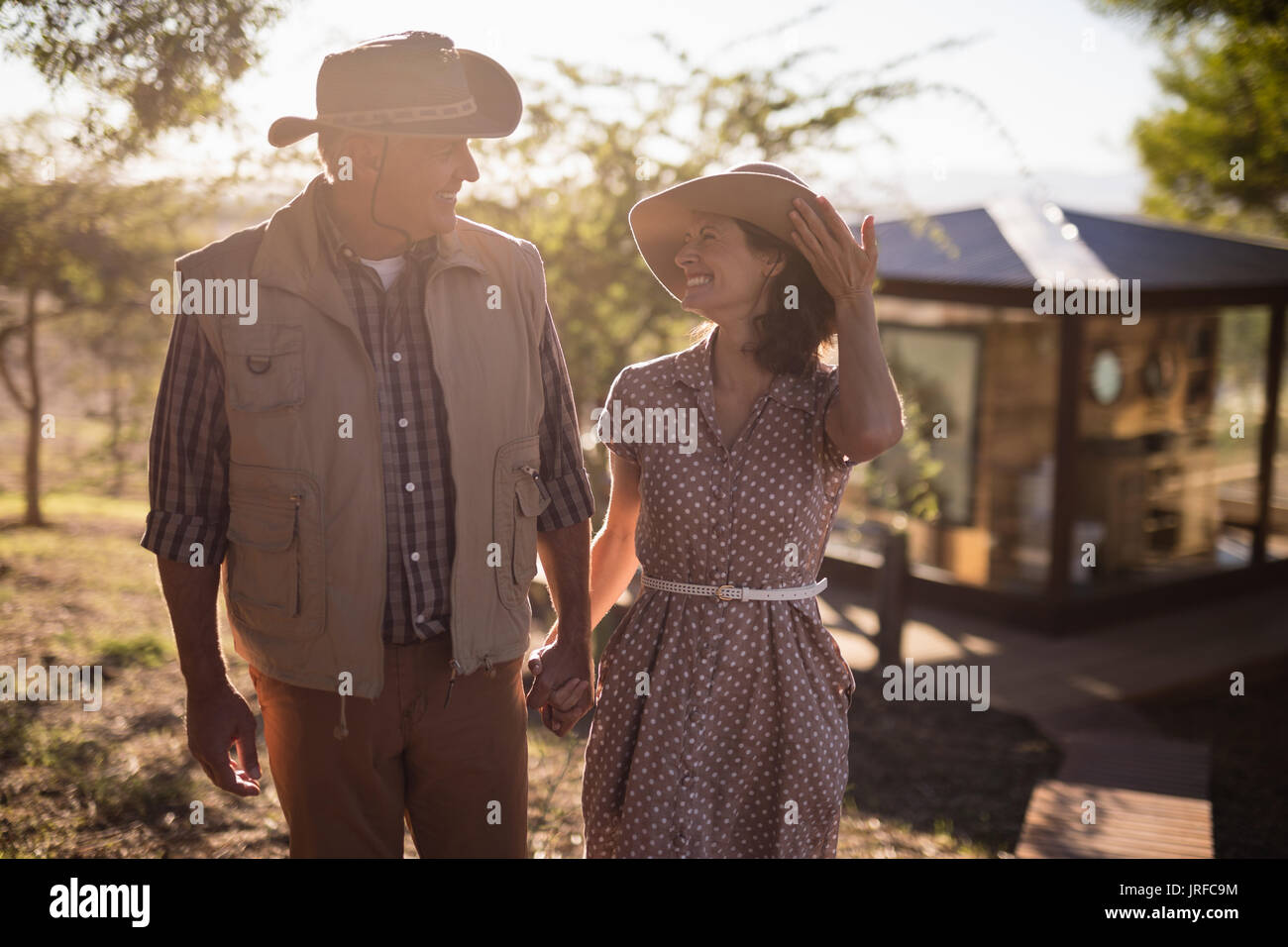 Senior couple holding hands Stock Photo