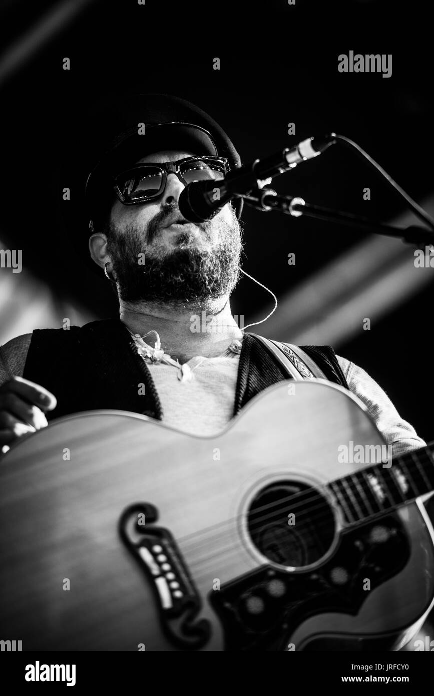 Edward Sharpe and the Zeros performing at a music festival in