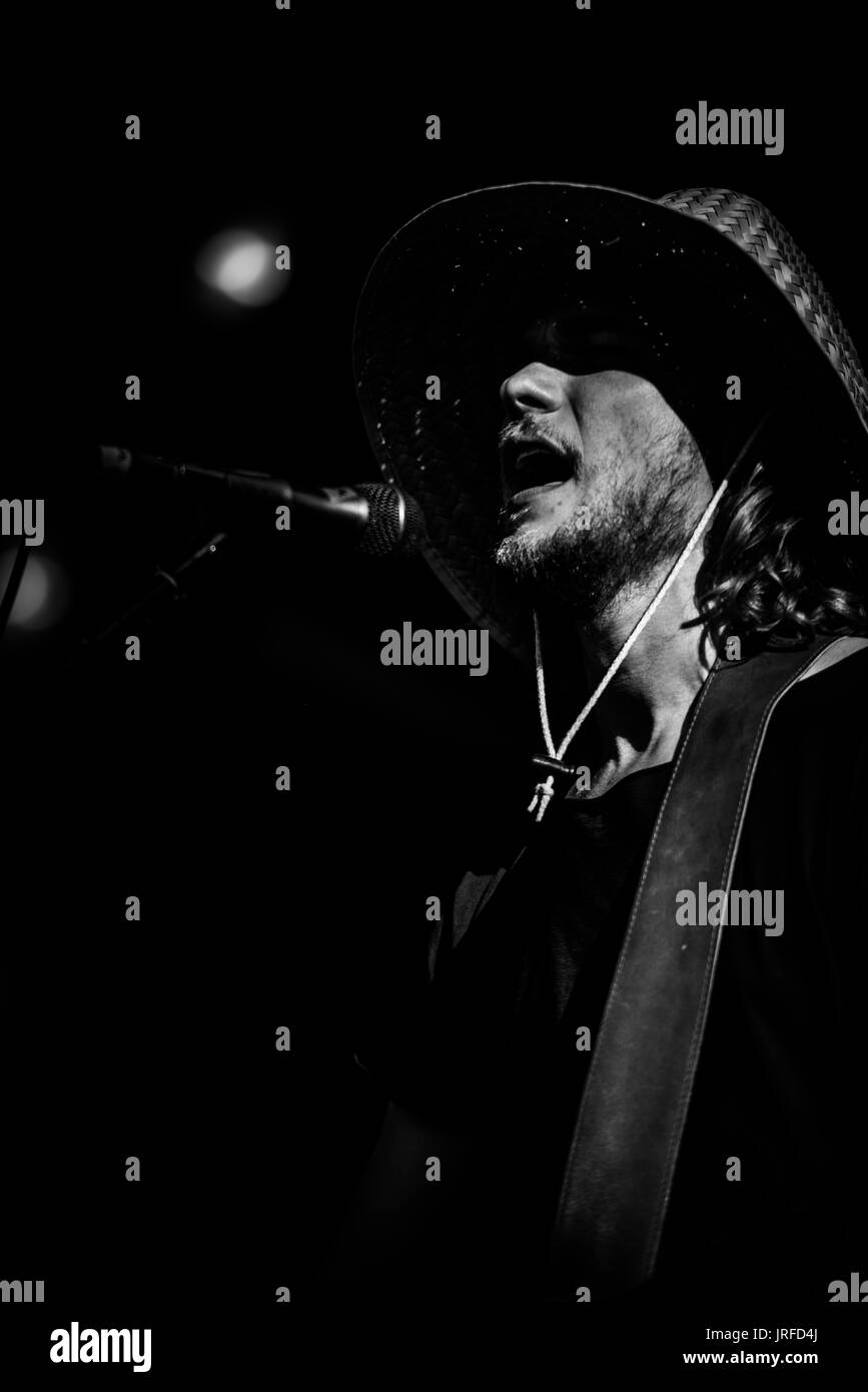 Edward Sharpe and the Magnetic Zeros performing at a music festival in British Columbia Canada in black and white. Stock Photo