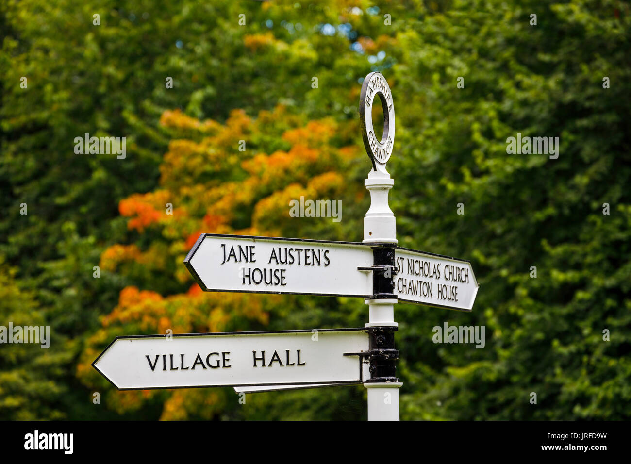Traditional style signpost pointing to Jane Austen's house on the ...