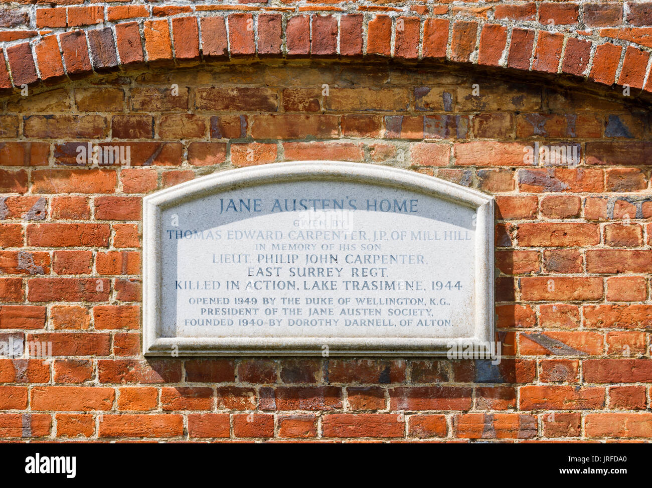 Memorial plaque on the wall of Jane Austen's House Museum in Chawton, Hampshire, southern England, UK Stock Photo