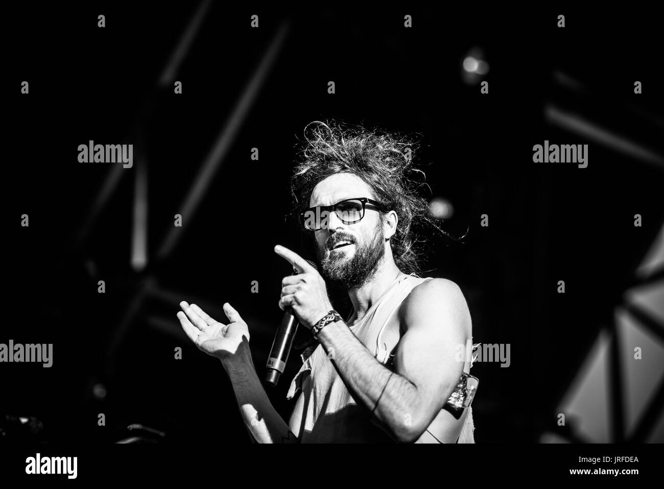 Edward Sharpe and the Magnetic Zeros performing at a music festival in British Columbia Canada in black and white. Stock Photo