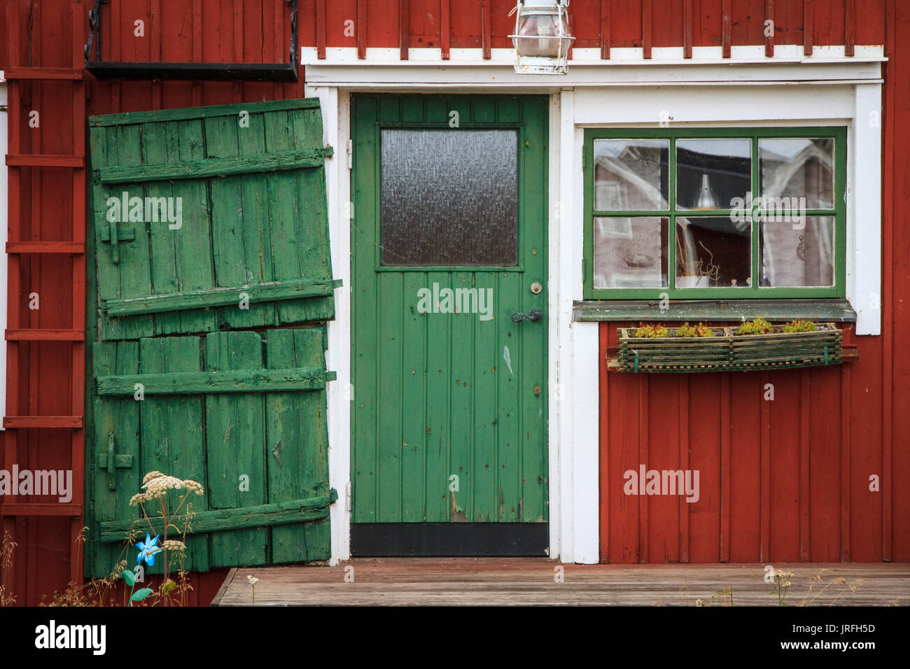 The front door of a traditional Swedish house in the Fishing village of Lorudden Stock Photo