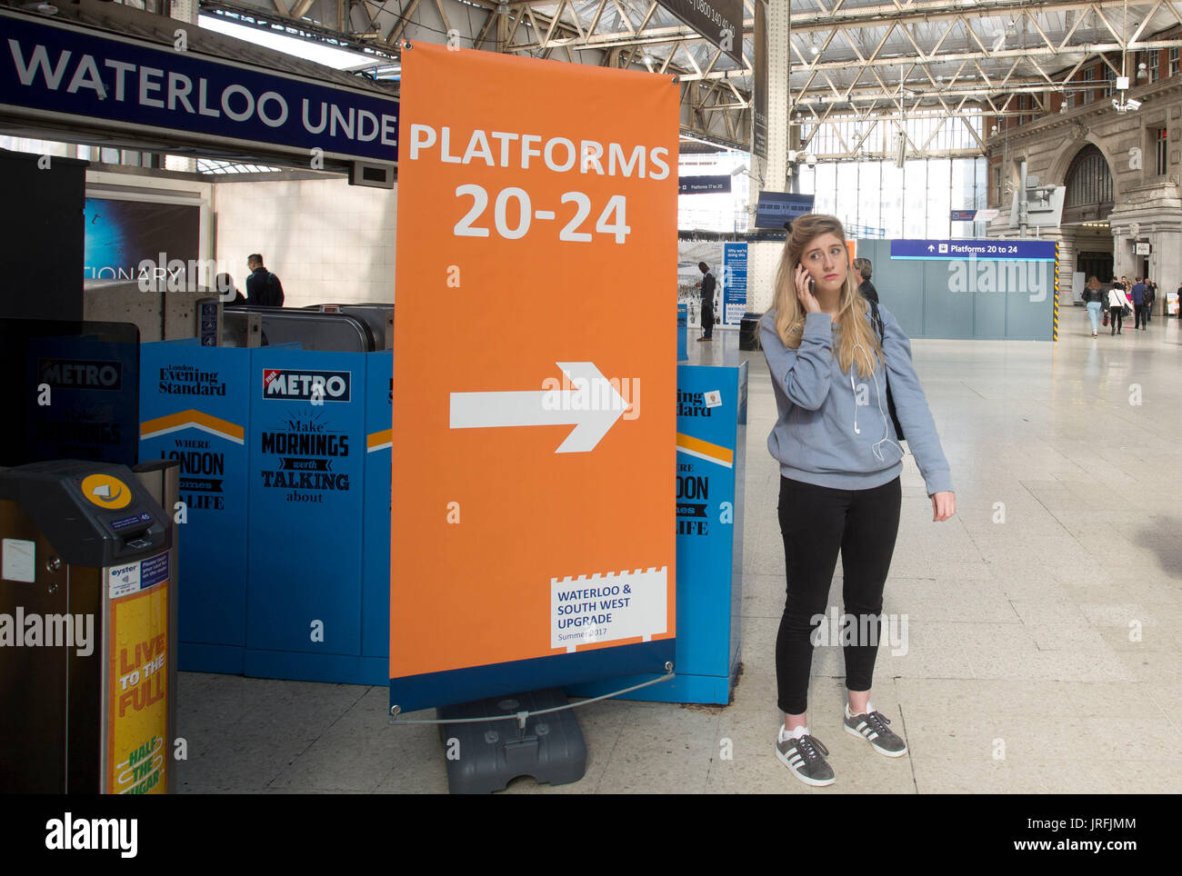A sign guiding passengers to the old Eurostar platforms which are being used as engineering work begins at London Waterloo railway station, with services to and from the station being significantly disrupted until August 28. Stock Photo