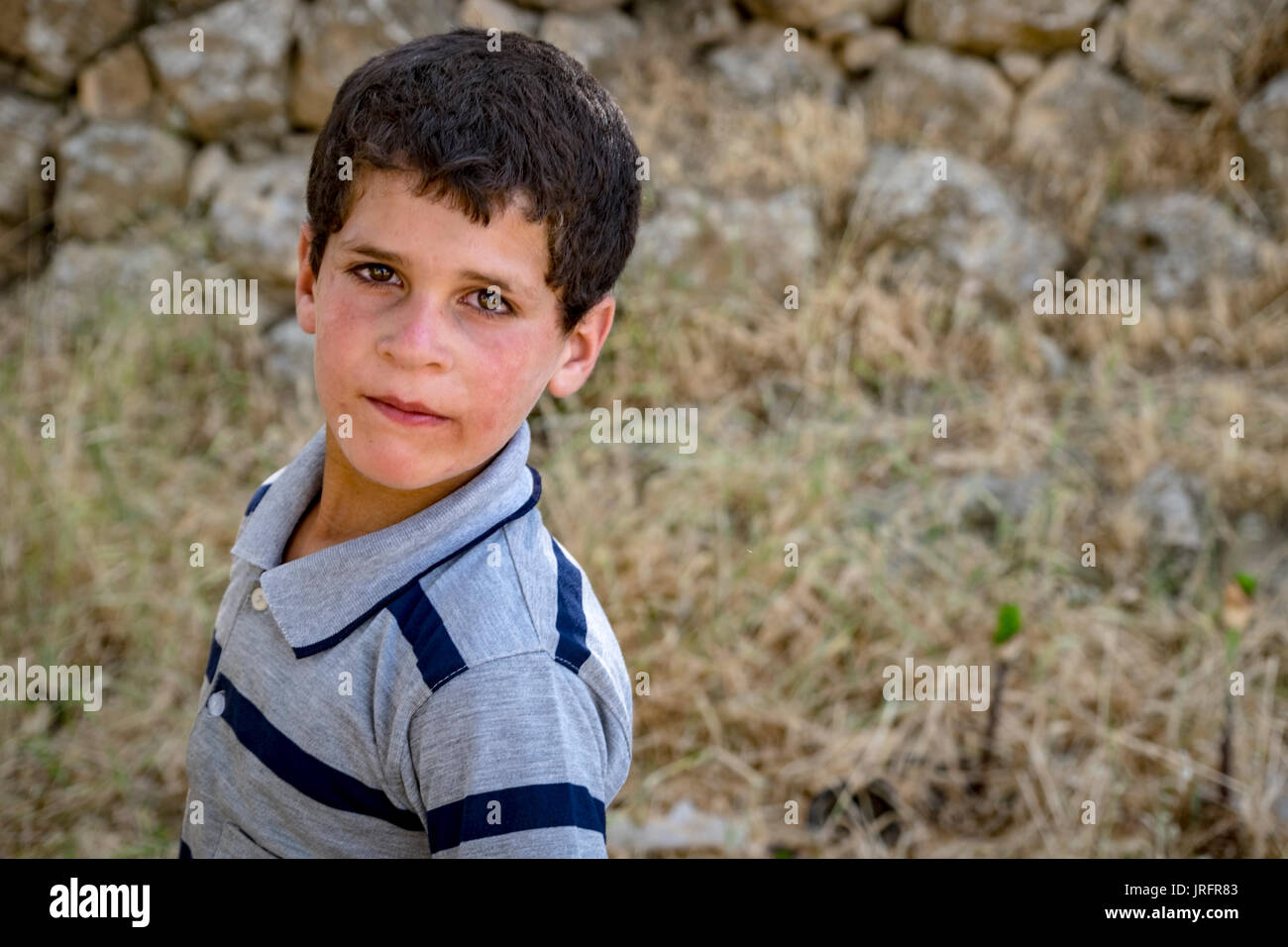 Young Palestinian boy living in central Hebron, West Bank, Occupied Territories Stock Photo