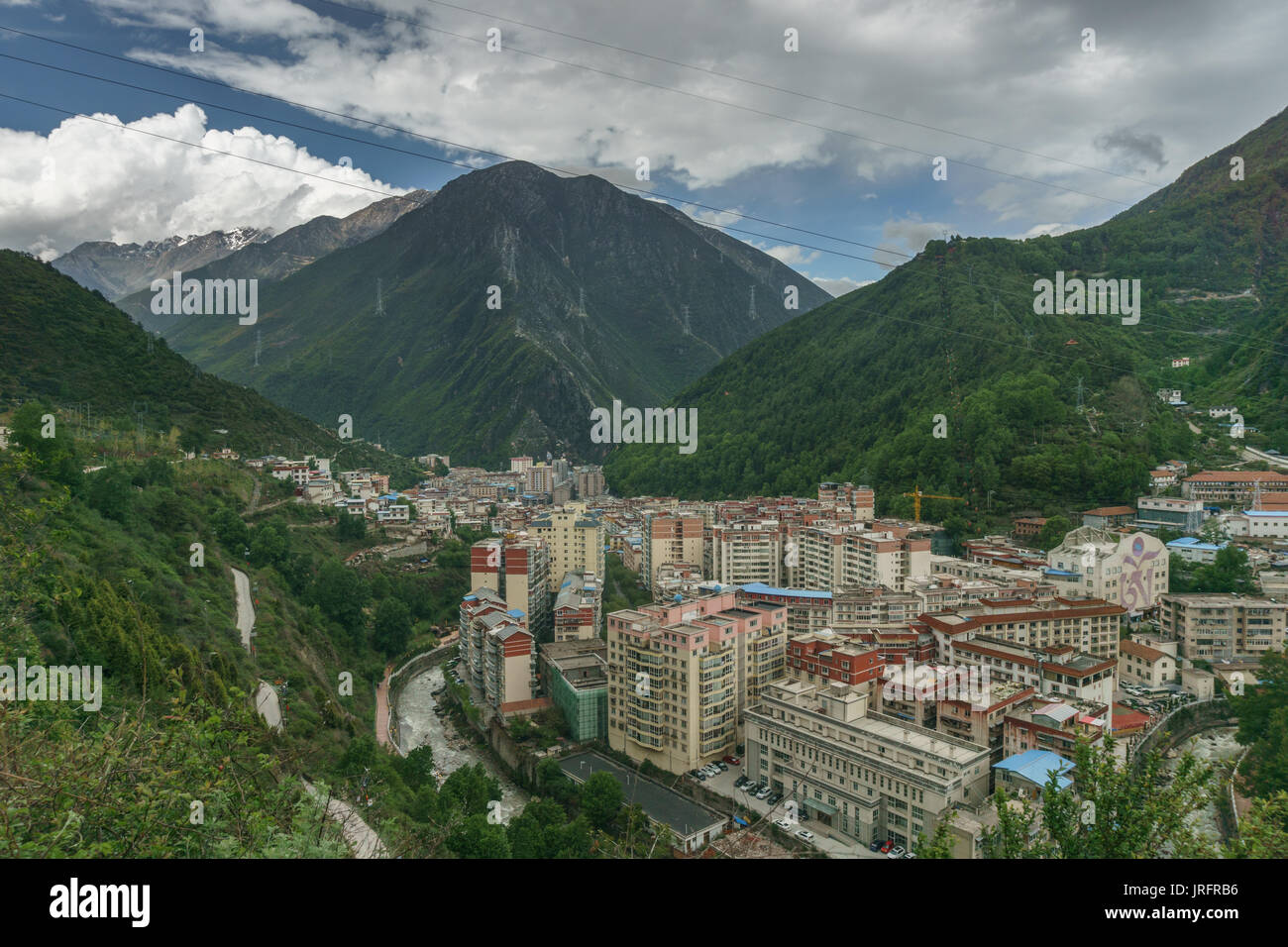 Valley full of prefabricated houses with more than 100 000 inhabitants crowded in a deep valley, Kangding town (Dartsedo), Garzê, Scihuan, China Stock Photo