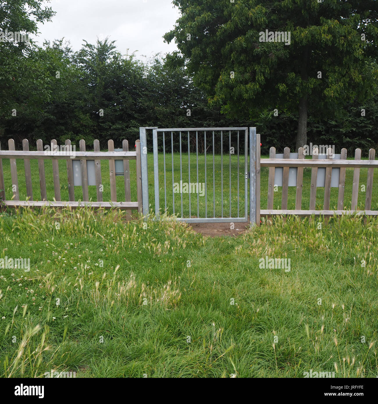 Perimeter gates in children's playground Stock Photo Alamy