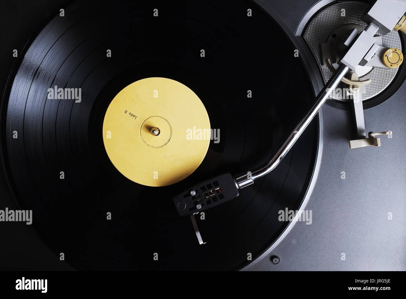 Old vinyl playing on a turntable. Retro and vintage themes Stock Photo ...