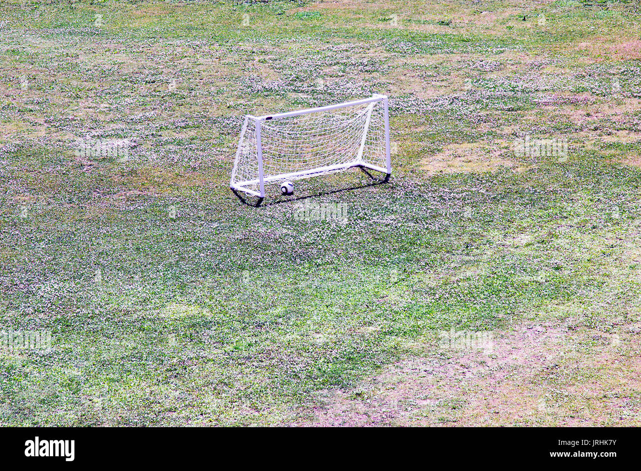 Mini football goal on an artificial grass hires stock photography and