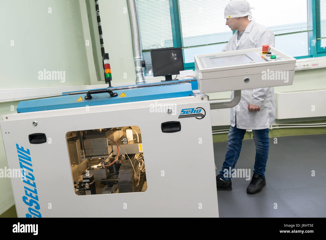 Production of electronic components at high-tech factory Stock Photo ...