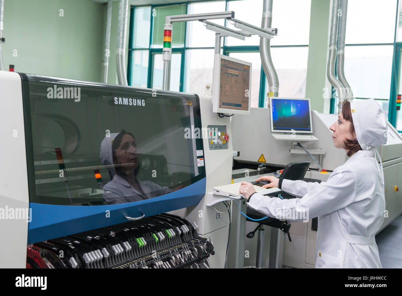 Production of electronic components at high-tech factory Stock Photo ...
