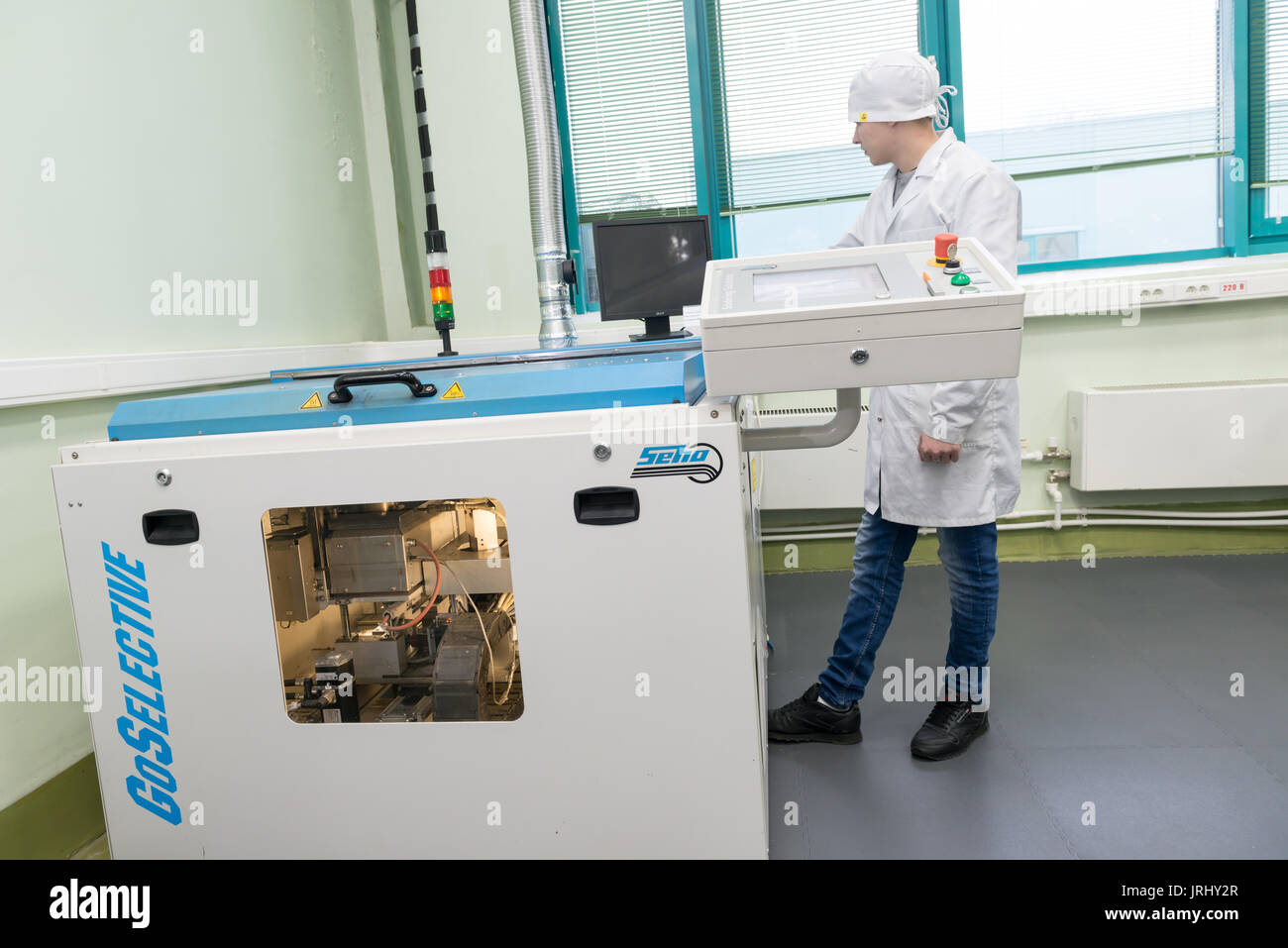 Production of electronic components at high-tech factory Stock Photo ...
