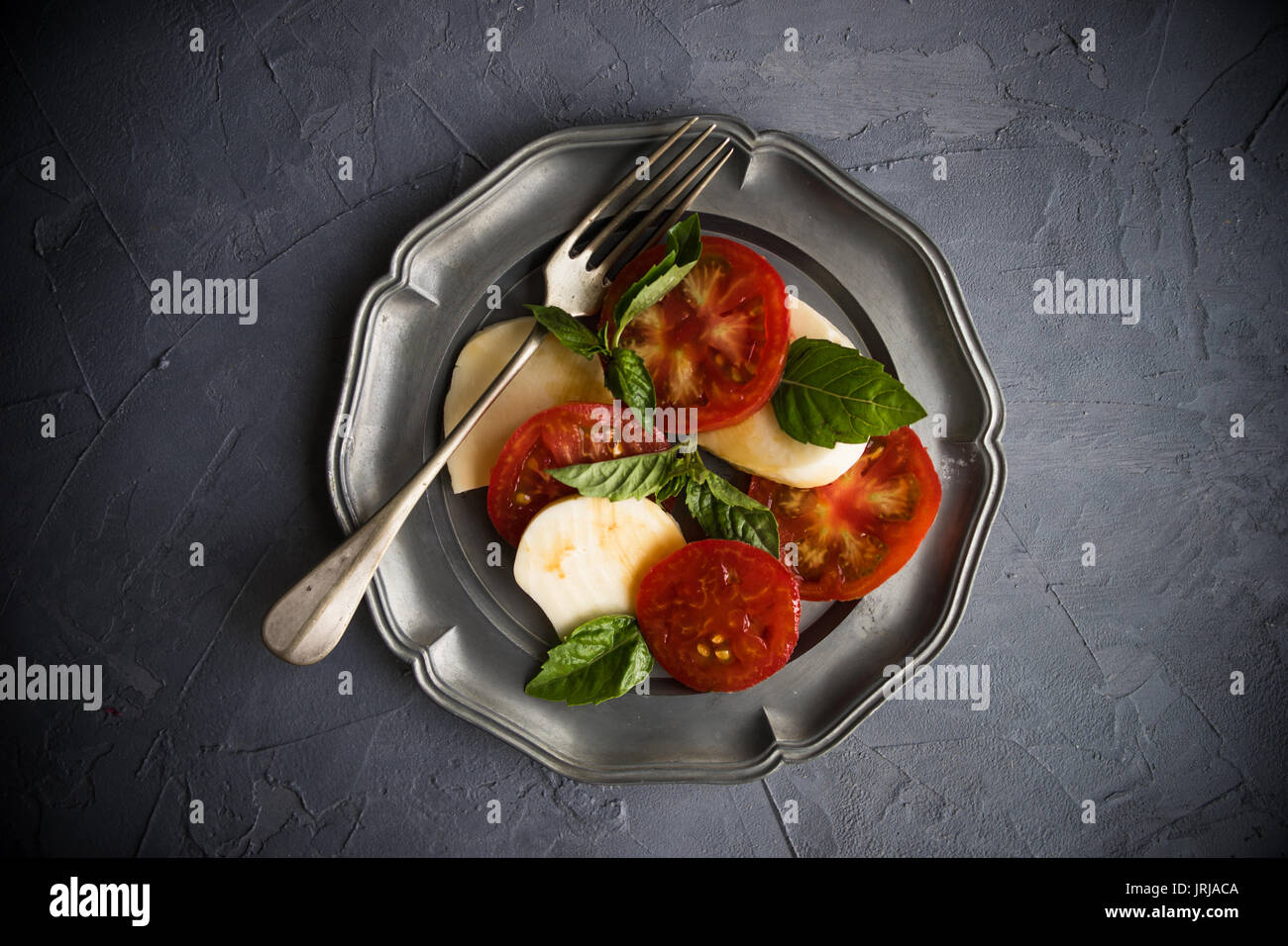 Traditional Mediterranean cuisine, Italian salad Caprese with tomatoes ...